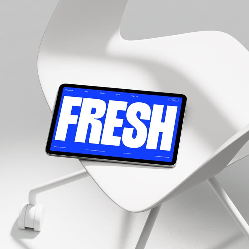 Tablet Mockup on Modern White Chair PSD