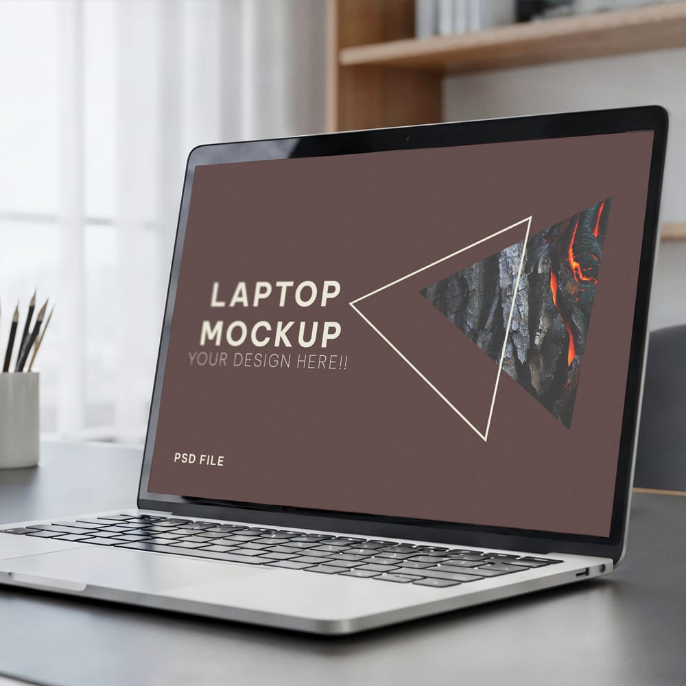 Free Laptop on Modern Office Desk Mockup PSD