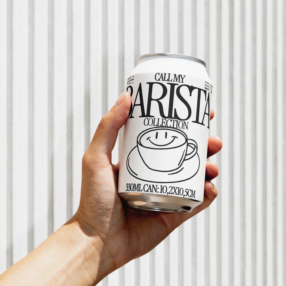 Free Realistic Hand Holding Can Mockup PSD