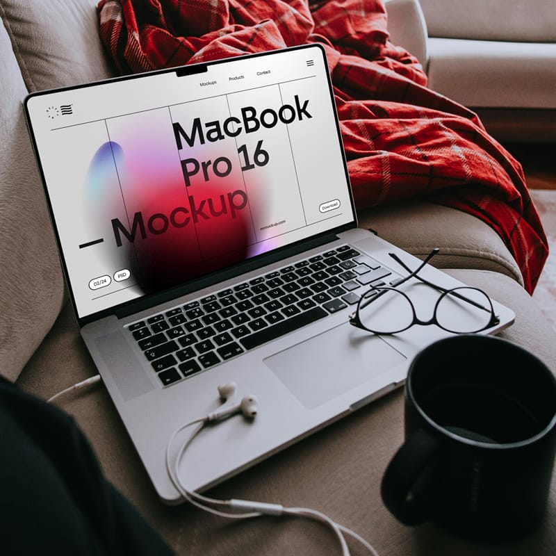 MacBook Pro Laying on Couch Mockup PSD