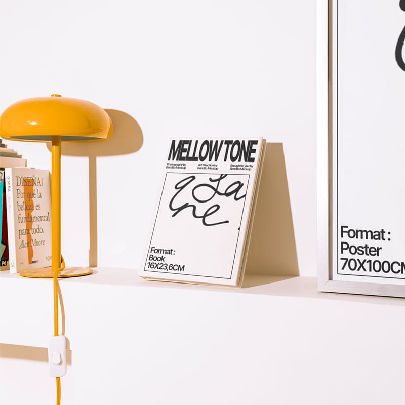 Realistic Hardcover Book Mockup on Studio Shelf PSD