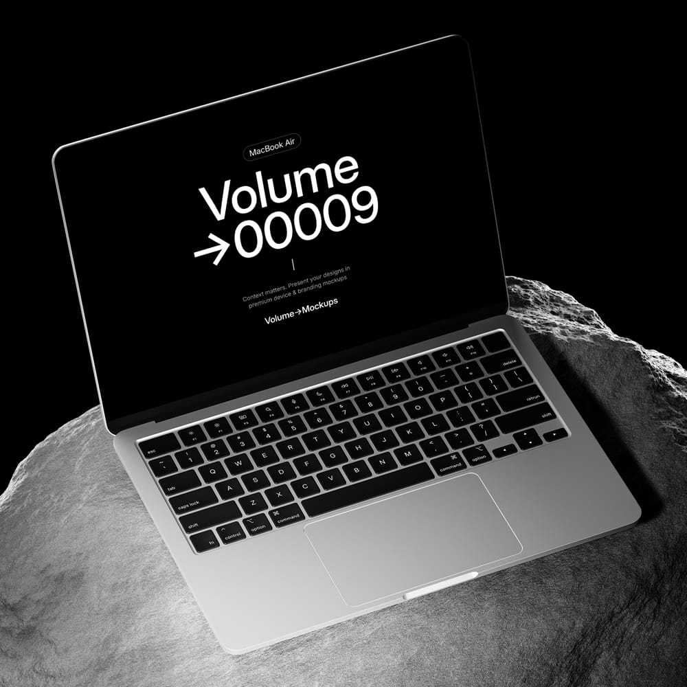 Free MacBook Air on Rocks Mockup PSD