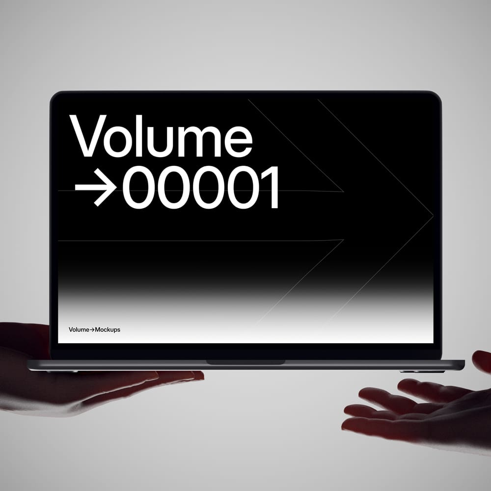Free MacBook Mockup in Hands PSD