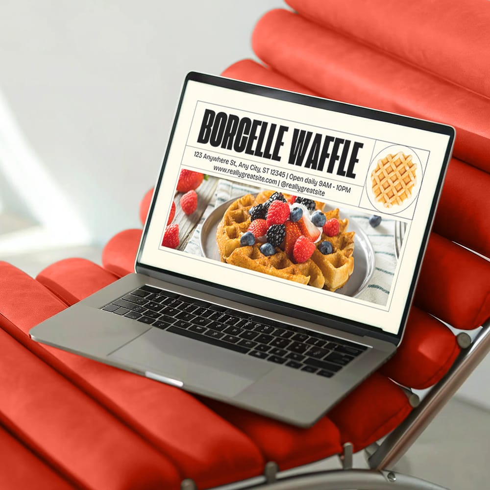 Free MacBook Pro Mockup on Modern Red Lounge Chair PSD