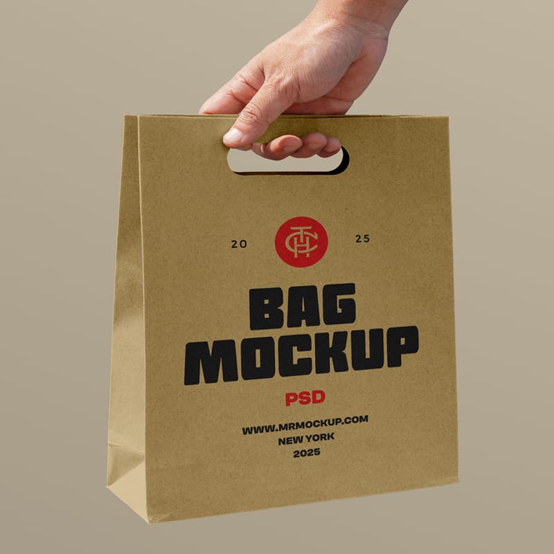 Holding Craft Paper Bag Mockup PSD