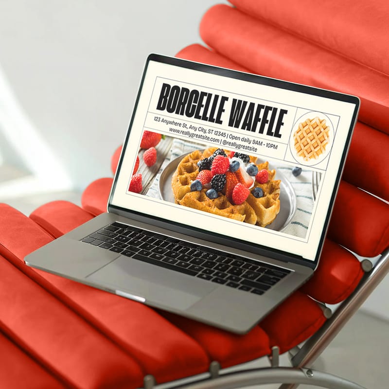 MacBook Pro Mockup on Modern Red Lounge Chair PSD