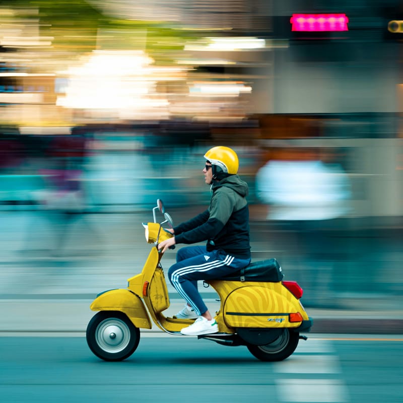 Scooter Driving Fast Mockup PSD