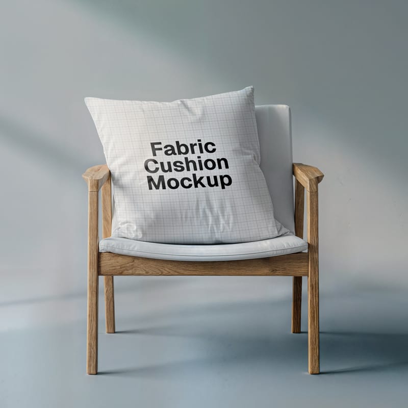 Fabric Cushion Mockup on Wooden Chair Interior Scene PSD