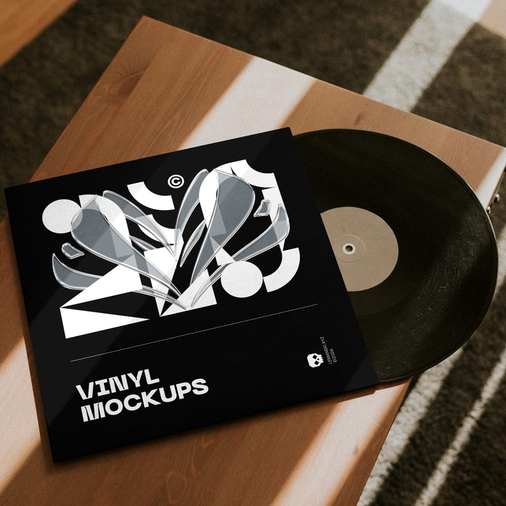 Free Lying Vinyl Pack on Wood Mockup PSD