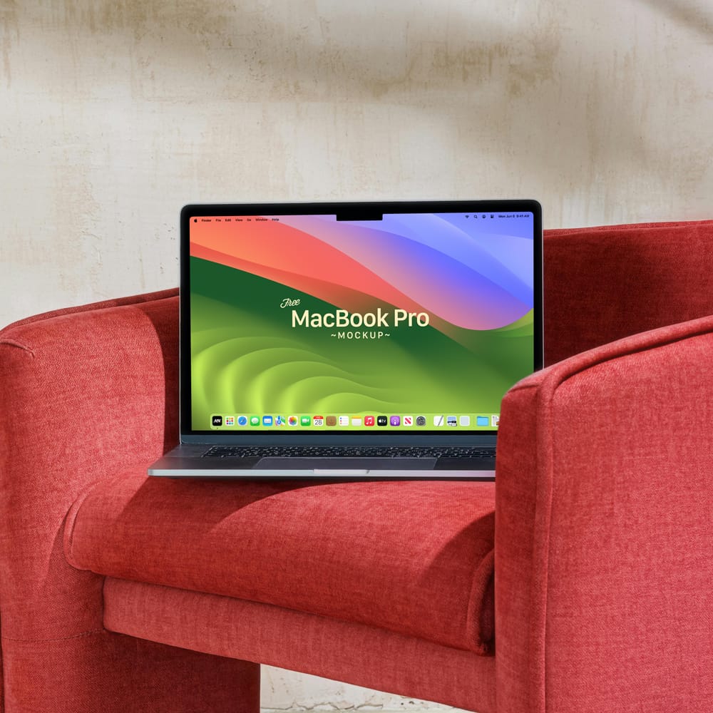 Free MacBook Pro On Sofa Mockup Template PSD
