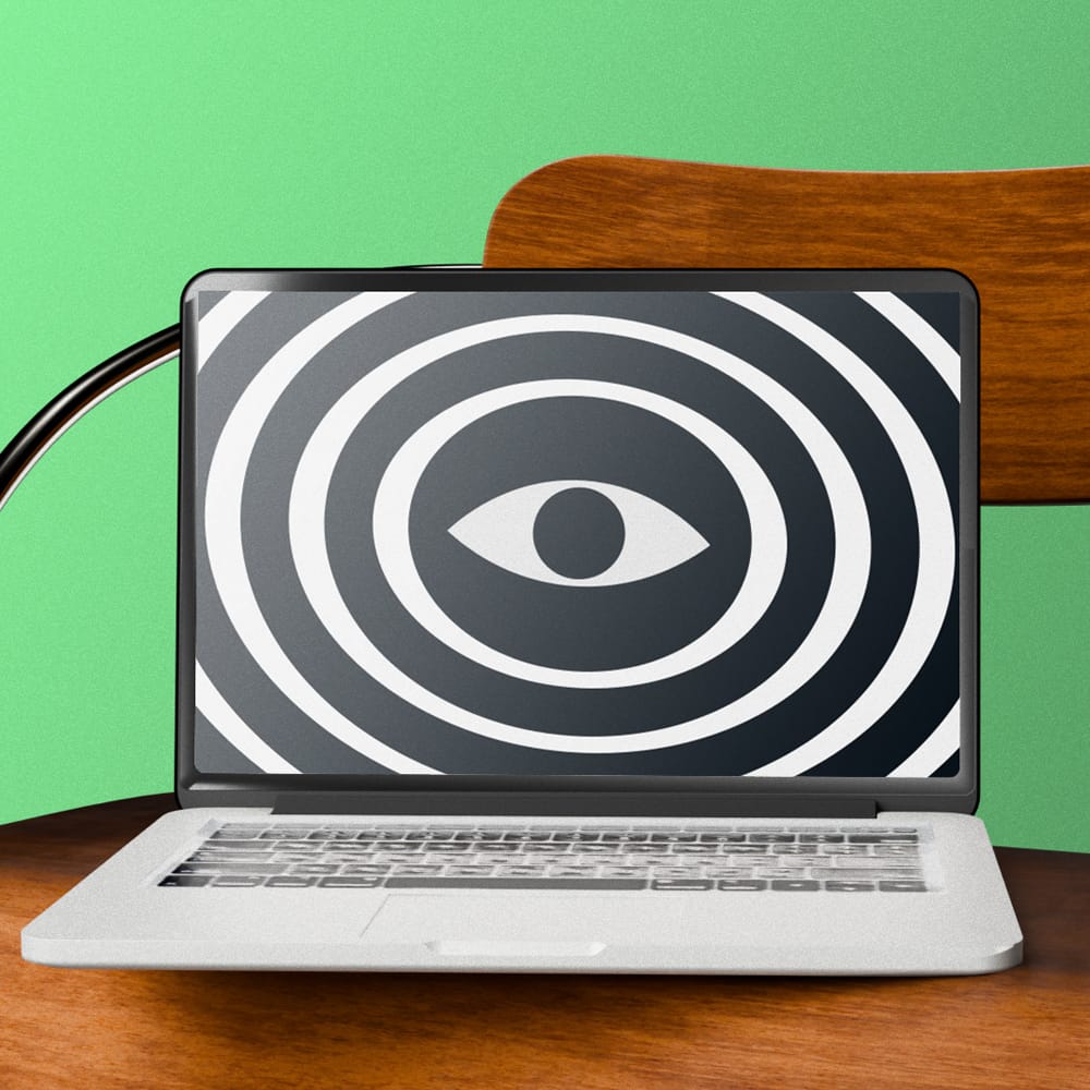 Free Minimalist MacBook Mockup on Vintage Wooden Chair PSD
