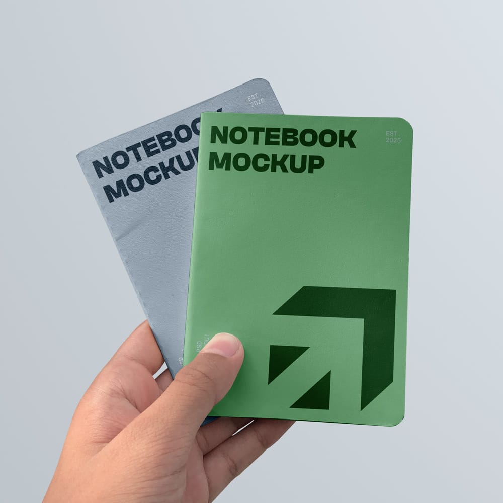Free Two Notebook in Hand Mockups PSD