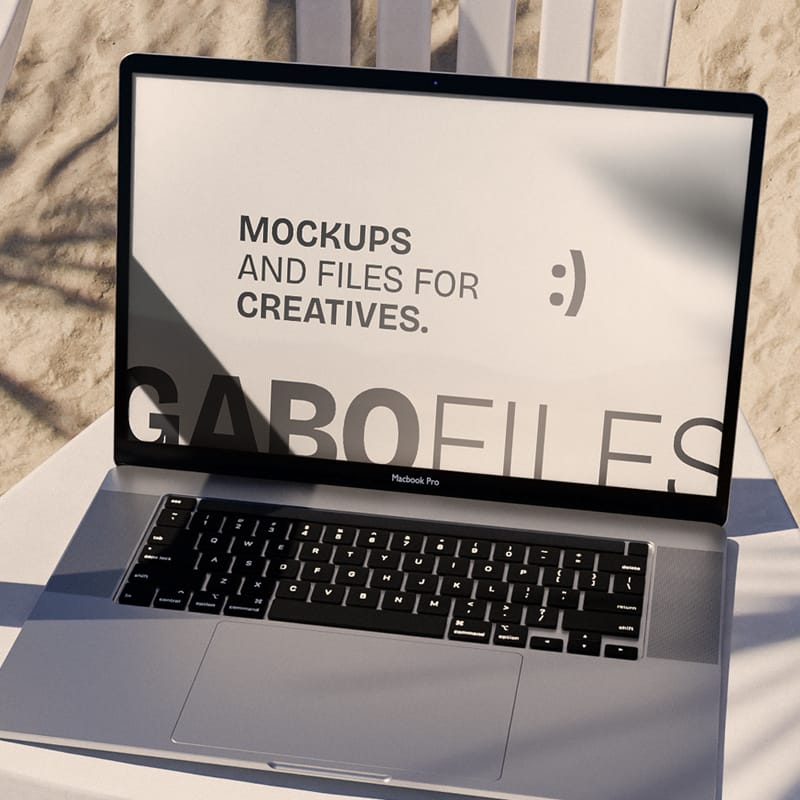 MacBook Mockup on Beach Chair PSD