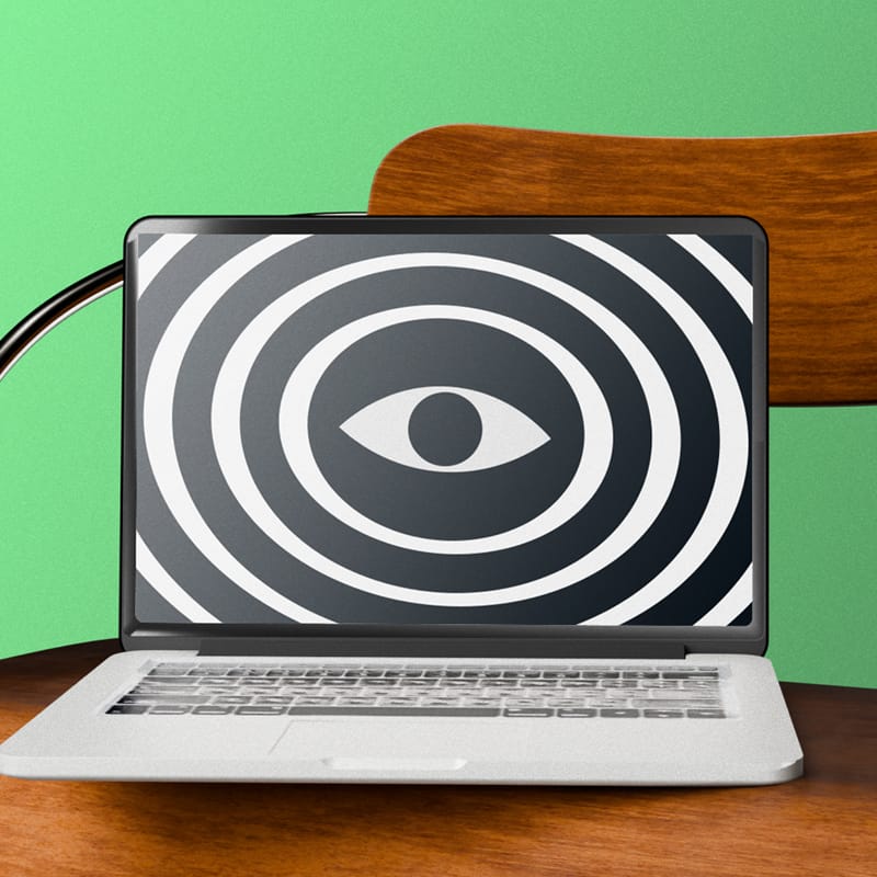 Minimalist MacBook Mockup on Vintage Wooden Chair PSD