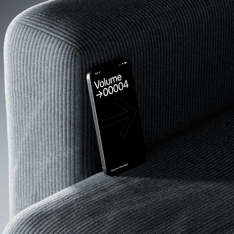 Minimalist iPhone Mockup on Corduroy Sofa PSD