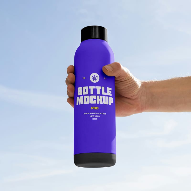 Tall Bottle in Hand Mockup PSD