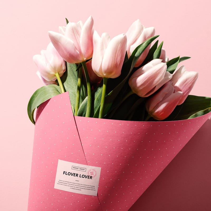 Close-up of Flowers Packaging Cone Mockup PSD