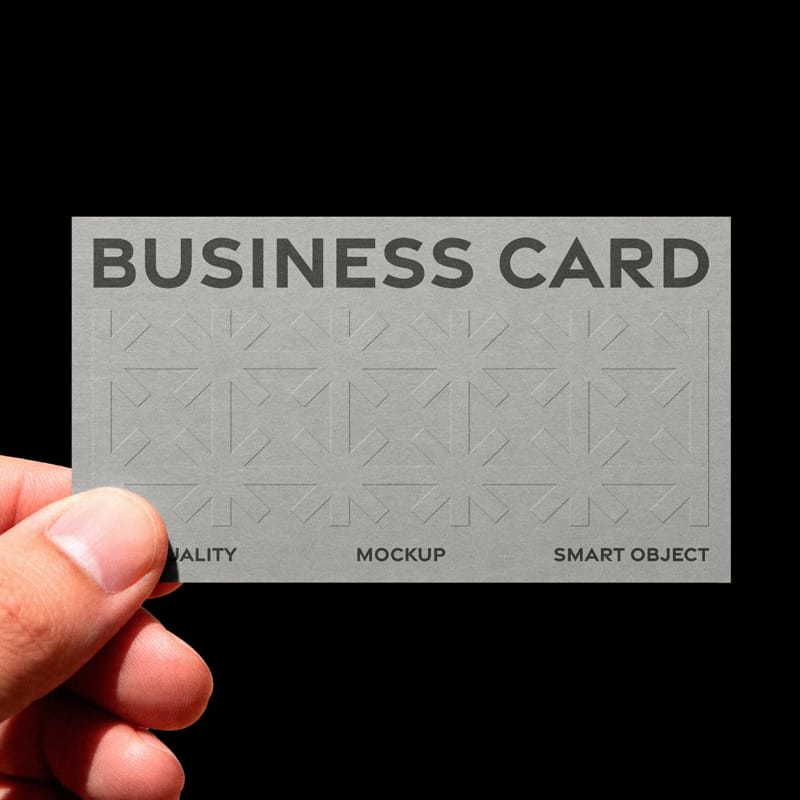 Embossed Business Card Mockup in Hand PSD