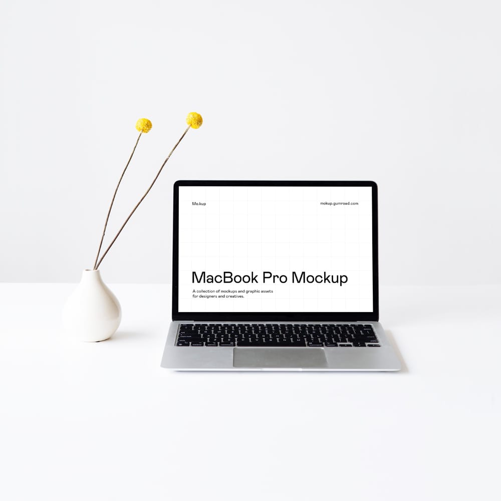 Free Clean White Workspace MacBook Pro Mockup PSD