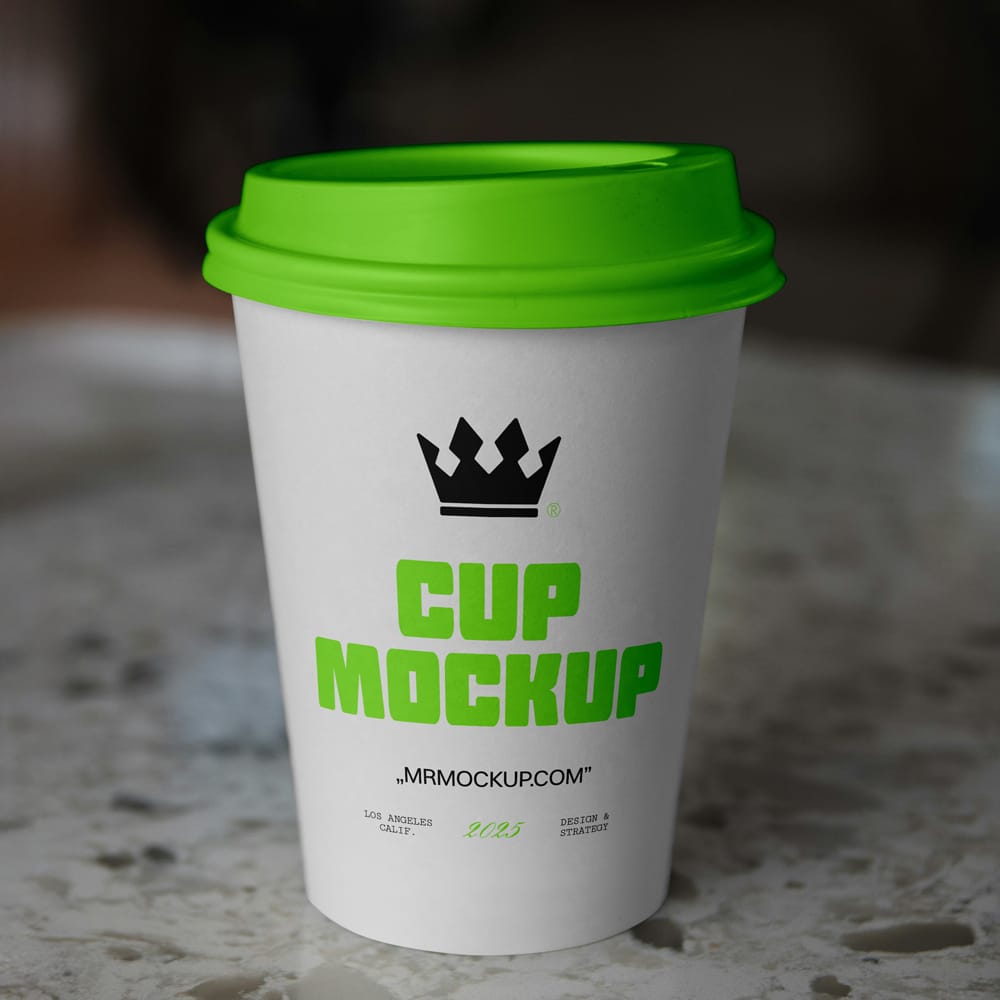 Free Coffee Cup on a Countertop Mockup PSD