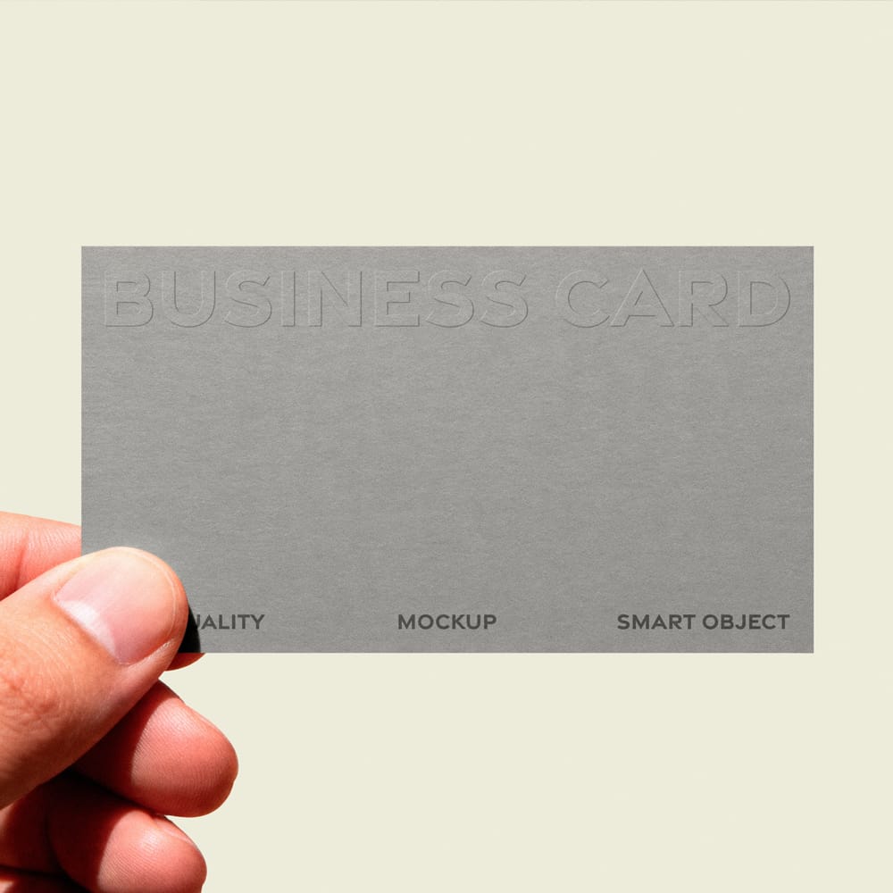 Free Embossed Business Card Mockup in Hand PSD