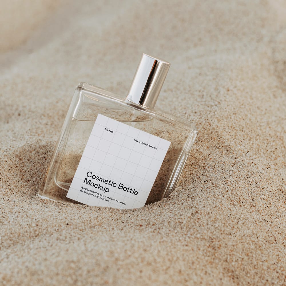 Free Glass Cosmetic Bottle Mockup on Sand PSD
