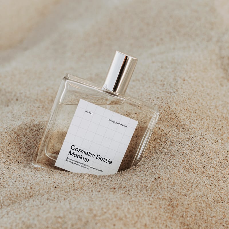 Glass Cosmetic Bottle Mockup on Sand PSD