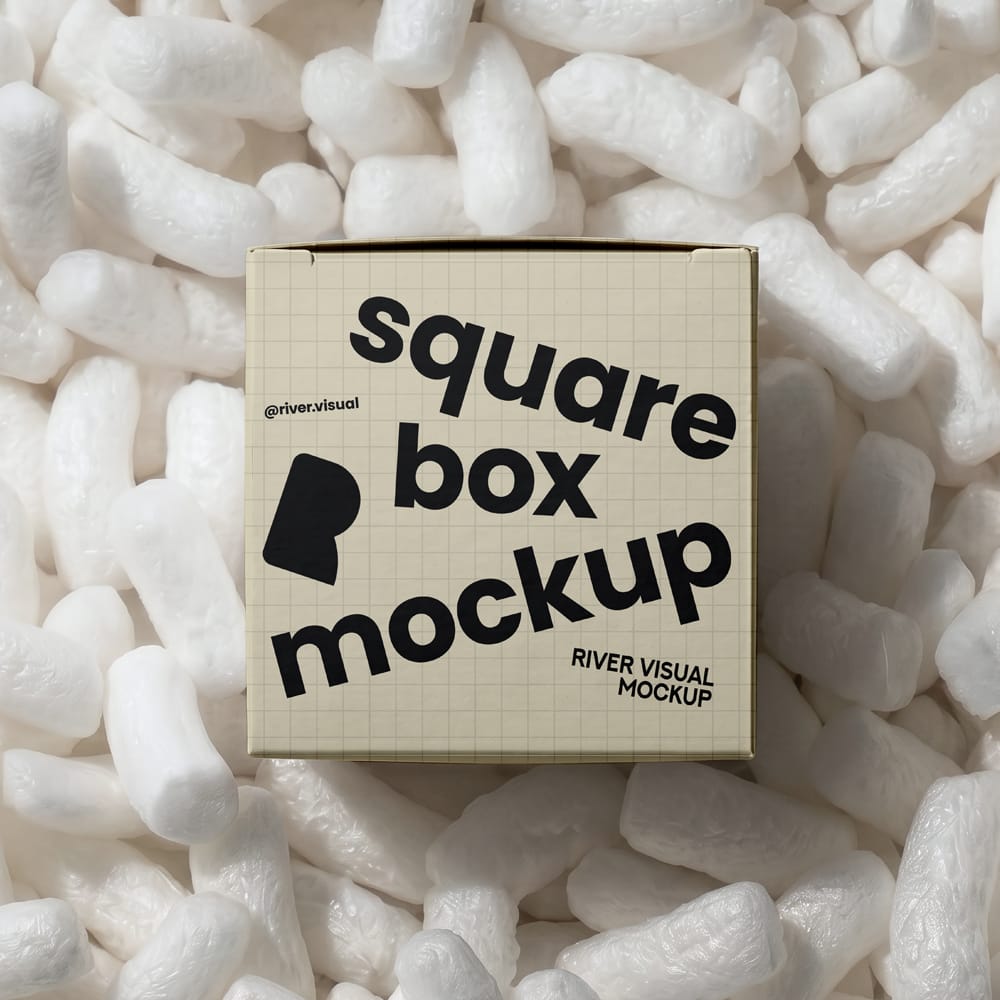 Free Square Packaging Box Mockup in Packing Peanuts PSD