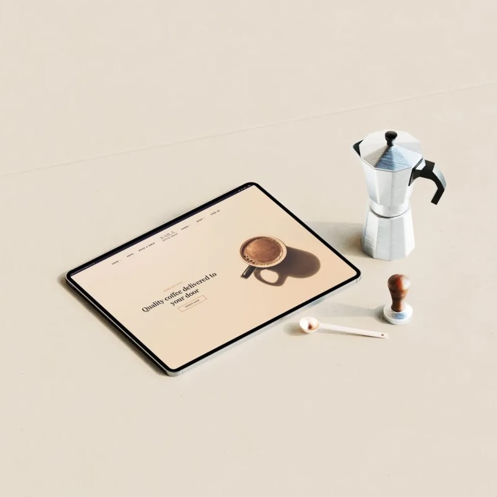 Free iPad Pro Mockup with Coffee Scene PSD