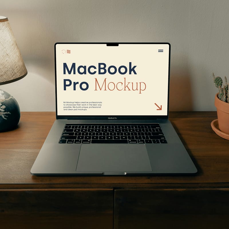 MacBook Pro On The Wooden Dresser Mockup PSD